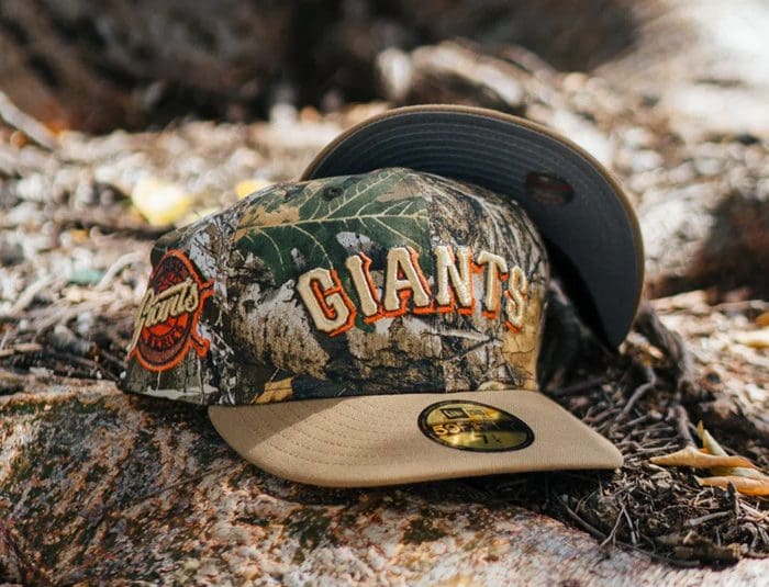 https://strictlyfitteds.com/wp-content/uploads/2023/10/san-francisco-giants-1954-world-series-realtree-camo-tan-59fifty-fitted-hat-mlb-new-era.jpg